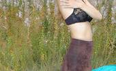 Nylon Passion Outdoor Strip Posing In Her Pantyhose In The Great Outdoors
