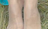 Nylon Passion 443129 Outdoor Strip Posing In Her Pantyhose In The Great Outdoors
