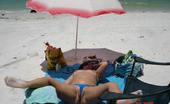 X Nudism 453253 Naughty Young Nudists Play With Each Other In Sand
