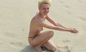 X Nudism Shy Teen Pops Her Top Off For All The Beach Goers
