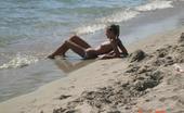 X Nudism 453328 Naughty Teen Shows Off Her Privates On The Sand

