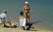 X Nudism 453328 Naughty Teen Shows Off Her Privates On The Sand

