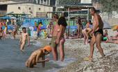 X Nudism 453378 Wild Brunette Teen Dances Nude At A Public Beach

