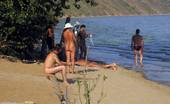 X Nudism 453419 Blonde Nudist Kicks Up Some Water At A Nude Beach
