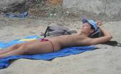 X Nudism 453419 Blonde Nudist Kicks Up Some Water At A Nude Beach
