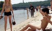 X Nudism 453478 Watch These Smooth Nudists Play At A Public Beach
