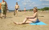 X Nudism All Eyes Are On This Young Nudist As She Sunbathes

