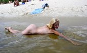 X Nudism 453516 Curvy Teen Bares All At A Nudist Beach In The Sun
