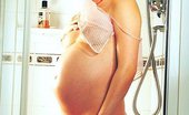 Pregnant And Fucked 454074 Pregnant And Fucked Pretty Preggo With An Enormous Belly Acting Sexy In The Shower And Flicking Her Bean
