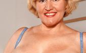 Grannies Fucked 458229 Blonde Granny Tit Tease Gorgeous GILF Model Strip Off Her Clothes In Front Of The Camera To Show Off Her Huge Racks
