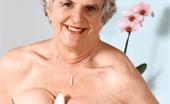 Grannies Fucked 458239 Hot GILF Pussy Spreading Grey Haired Grandma Hikes Up Her Skirt To Show Off Her Wrinkled Twat And Rub Her Spot
