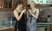 Licksonic 461917 Natali & Gloria Outrageously Hot Lesbian Chick Shows Her Tongue Skills Right In The Kitchen
