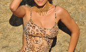 Met Art 462969 Met Art Naezo Suzanna A Showcases Her Statuesque Figure, Her Animal Printed Dress Pulled Slightly To Reveal Her Round, Perky Breasts, While The Cool Frothy Water Of The Beach Kissing Her Long And Smooth Legs Suzanna A Goncharov Naezo
