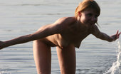 Nude Beach Dreams 469380 Cute Naked Girl Having A Cold Drink While Walking In The Water Nude Beach Dreams
