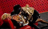 Orgasmatics 469985 Nessa Devil Cuties Filming Their Lesbian Sex On The Large Red Couch Orgasmatics
