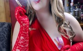 Ms Inhale 470420 Cigarette Holder And Lace Gloves MsInhale Wears Long Red Lace Gloves While She Smokes A Menthol Cigarette Ms Inhale
