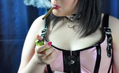 Ms Inhale 470424 Smoking In A Corset Bad Girl Smoker Chloe Smokes A Small Cigar While Wearing Her Pink PVC Corset Ms Inhale
