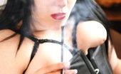 Ms Inhale 470427 Pink Cigarette In A Holder MsInhale Smokes A Pink Cigarette In A Holder While Wearing A Leather Corset Which Shows Off Her Naked Breasts Ms Inhale
