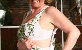 Stocking Aces 471784 Sue In A Flowery Dress And Tanned Stockings Stocking Aces
