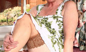 Stocking Aces 471784 Sue In A Flowery Dress And Tanned Stockings Stocking Aces
