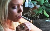 Pure Smoking 473767 Happy Smoker0Blonde Bombshell Lonnie Enjoys The Taste Of Her Freshly Lit Cigarette Pure Smoking
