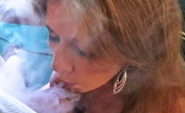 Pure Smoking 473898 Sexy Smoker On Her Knees2Felanee Performs Felatio As Smoke Covers Her Face Pure Smoking
