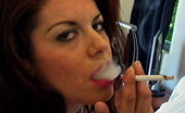 Pure Smoking 473968 Smokin HotLatina Lovely Puffs Away As She Throws You A Come-Hither Glance Pure Smoking
