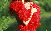 AV Erotica 476030 Kesy Skinny And Petite Redhead Kesy Posing Naked With The Red Boa AV Erotica
