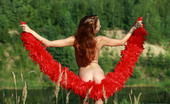 AV Erotica 476030 Kesy Skinny And Petite Redhead Kesy Posing Naked With The Red Boa AV Erotica
