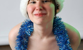AV Erotica 476182 Hope Brunette Posing In Santa'S Hat And Wishing You Merry XMas! AV Erotica
