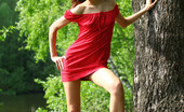 AV Erotica 476188 Brigitte Tattooed Chick Removes Her Red Dress By The River AV Erotica
