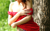 AV Erotica 476188 Brigitte Tattooed Chick Removes Her Red Dress By The River AV Erotica
