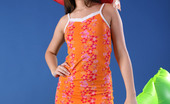 AV Erotica 476539 Liona Liona In Summer Dress And Red Hat Fondles Ass While Lying On Green Tube AV Erotica
