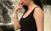 Smoking Mina 477955 Smoking Babe Enjoys A Cigarette By A Waterfall Smoking Mina
