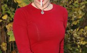 Smoking Mina 477960 Sexy Smoking Babe In Red Has A Cigarette On A Park Bench Smoking Mina
