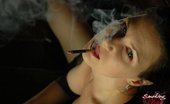 Smoking Mina 478023 Brunette Babe Rubbing Her Boobs While Smoking Smoking Mina
