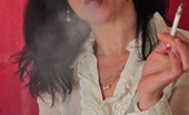 Smoking Mina 478043 Mina Enjoys A Filterless 120 Smoking Mina
