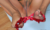 Nylon Feet Line 481876 Ida Curly Babe Playing With Foot Embellishment While Flashing Her Silky Tights Nylon Feet Line

