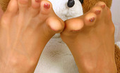 Nylon Feet Line 481990 Hannah Curly Redhead Cutie Rubbing Her Nyloned Feet Against Her Favorite Plush Toy Nylon Feet Line
