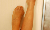 Nylon Feet Line 482402 Keegan Frisky Chick Savoring The Taste Of Sheer Nylon On Her Well-Maintained Feet Nylon Feet Line
