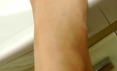 Nylon Feet Line 482432 Jasmin Red-Haired Chick Tenderly Touching Her Feet While Fitting On New Pantyhose Nylon Feet Line
