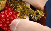 Nylon Feet Line 482712 Atlantida Cutie In Her Santa Costume And White Pantyhose Playing With Her Tasty Feet Nylon Feet Line
