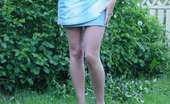 MY NN GF 482874 Pics Of A Sexy Brunette Cutie In A Mini Skirt Posing In The Garden MY NN GF
