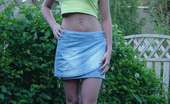 MY NN GF 482874 Pics Of A Sexy Brunette Cutie In A Mini Skirt Posing In The Garden MY NN GF
