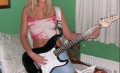 MY NN GF 482882 Hot Amateur Pics Of A Blonde Rockstar Cutie Posing With Her Guitar In Bed MY NN GF
