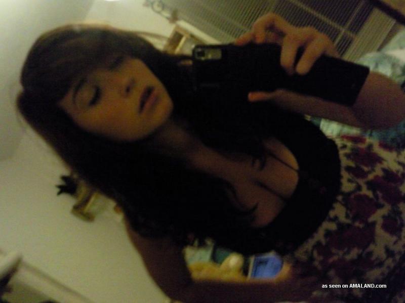 Hot cutie with large tits posing on webcam