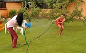 All Wam 486749 Two Hot Lesbian Babes Playing With A Garden Hose Outside All Wam
