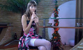 Lacy Nylons 493534 Florence Dark-Haired Smoker Dildo Toying In Her Floral Dress And White Lacy Nylons Lacy Nylons
