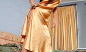 Lacy Nylons 493594 Linda Sunny Babe In A Shiny Satin Dress With Barely There Stockings Parting Legs Lacy Nylons
