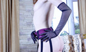 Lacy Nylons 493959 Dominica Gloved Babe In A Chic Frilly Gown With Pink Nylons And A Matching Suspender Lacy Nylons
